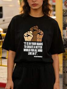 Women's Summer Clothing, Soft And Casual Cotton T-Shirt With A Round Neck, Featuring The Phrase "IT'S IN YOUR HANDS TO CREATE A BETTER WORLD FOR ALL WHO LIVE IN IT" Printed On The Design. Black Color. - 黑色 - 查看 2