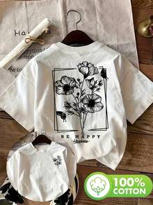 Esta es una camiseta estampada reversible con un diseño minimalista de flores y mariposas.Está hecho de material puro, es adecuado para un ajuste holgado y es versátil para uso casual.Es lavable a máquina.Camiseta Y2k - Blanco - Ver 1
