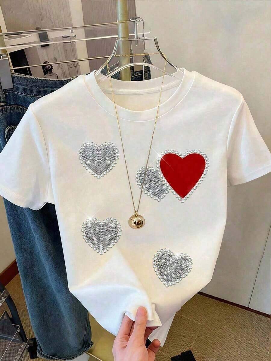 Camiseta casual de cuello redondo para mujer, estampado de corazón brillante con efecto lentejuelas, blusa versátil y moderna, tela ligeramente elástica, ideal para uso diario. - Blanco - Ver 1