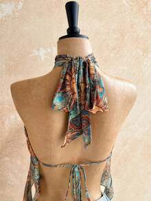 Blusa de mujer con encaje bordado, escote halter, espalda descubierta, tirantes con lazo, bajo fluido y elegante, adecuada para la playa, cruceros y resorts - Multicolor - Ver 6