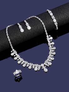 A Set Of Elegant And Minimalist Jewelry For Ladies, Including A Drop-Shaped Cubic Zirconia Necklace, Earrings, Bracelet And Ring. Suitable For Both Daily Wear And Formal Occasions. - B0473-r4S - View 1