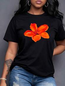 Una vibrante flor naranja y roja despliega sus pétalos con majestuosidad simbolizando la pasión la energía vital un toque de naturaleza radiante que encanta Camiseta de mujer 100% algodón suave fresca para verano casual,maija mujer curvy. - Negro - Ver 1