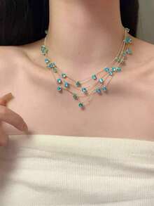 1 chiếc vòng cổ nhiều lớp tua rua màu xanh sao tinh tế, thời trang, phù hợp cho phụ nữ đeo trong mọi dịp, món quà tuyệt vời dành cho người yêu. - Xanh đậm - Xem 4
