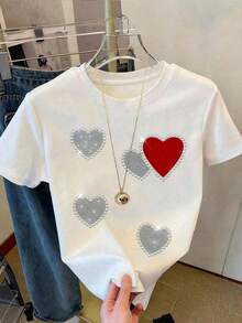 Camiseta casual de cuello redondo para mujer, estampado de corazón brillante con efecto lentejuelas, blusa versátil y moderna, tela ligeramente elástica, ideal para uso diario. - Blanco - Ver 7
