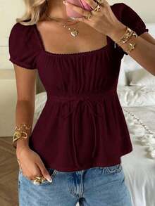 Camiseta casual de mujer con estampado de lunares y cintura con lazo en color amarillo - Burdeos - Ver 1