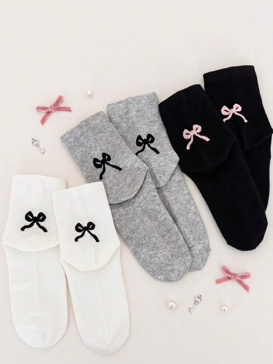 Conjunto de 3 pares de meias femininas de cano médio em tricô com laço, em cores sólidas. Design charmoso e delicado, confortável, respirável e casual, perfeito para o dia a dia e para atividades ao ar livre em todas as estações. - Multicolorido - Ver 1
