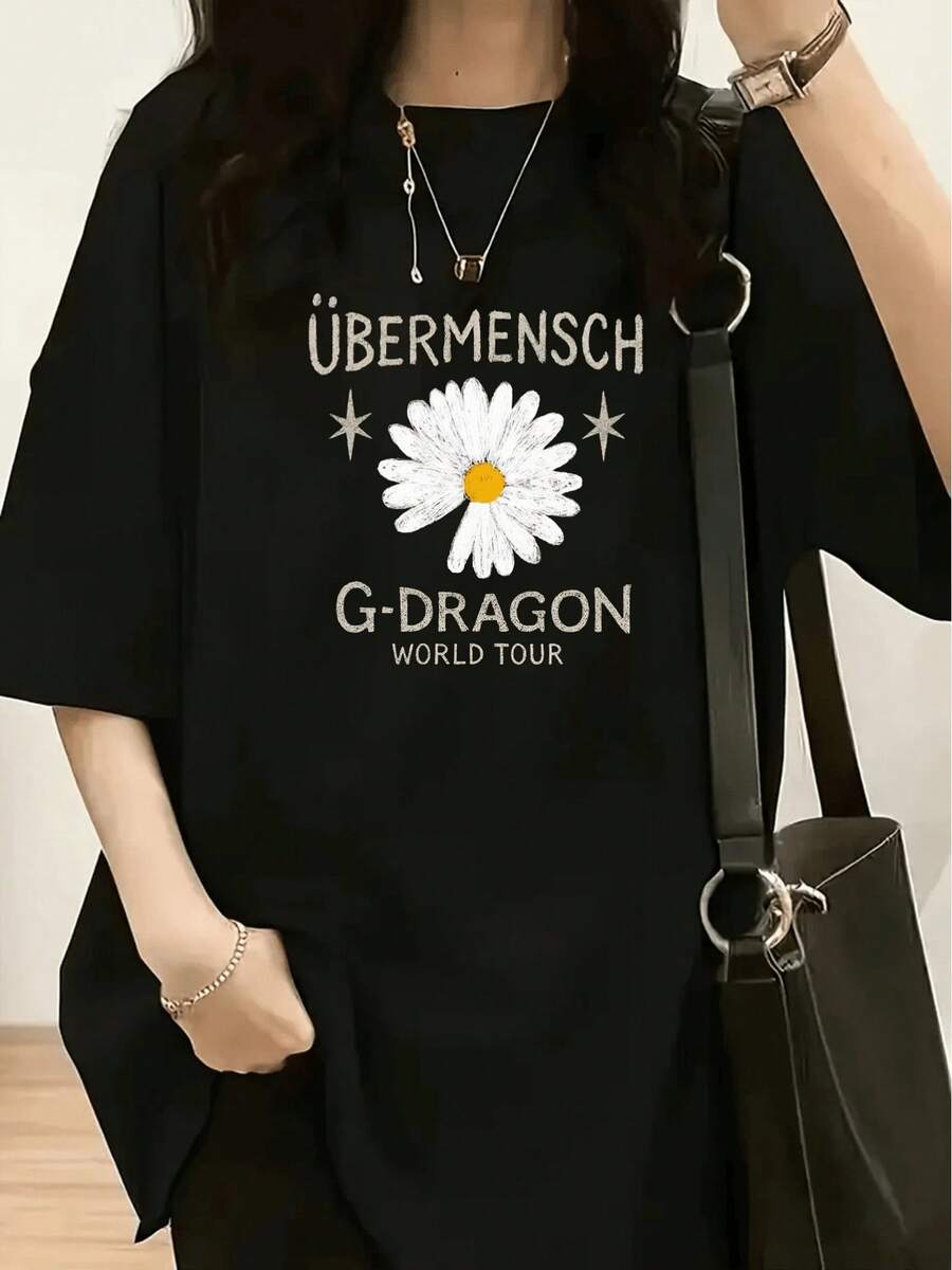 Nueva camiseta casual de mujer, moderna y a la moda, con diseños de los conciertos de la gira mundial de ÜBERMENSCH y G-DRAGON - estampado floral vintage, margaritas blancas con centros amarillos, adornada con detalles de estrellas, camiseta de manga corta de corte holgado, adecuada para primavera y verano, camiseta estampada casual, cómoda y holgada - camiseta unisex de manga corta, cuello redondo, de algodón puro, estilo vintage urbano y corte holgado. - Negro - Ver 1