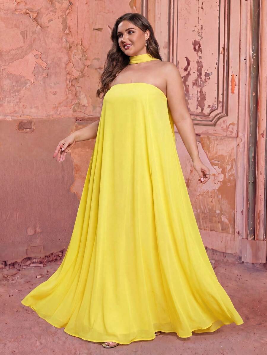 Faeriesty Elegante vestido largo de gasa con hombros descubiertos y tirantes finos para tallas grandes. Confeccionado en tela de gasa fluida, con diseño de lazo lateral y espalda abierta. Silueta holgada de línea A. - Amarillo - Ver 1