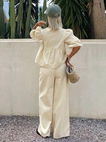 Blusa de mezclilla con cuello de corbata, mangas abullonadas y volante, y pantalón vaquero de pierna ancha - Albaricoque - Ver 3