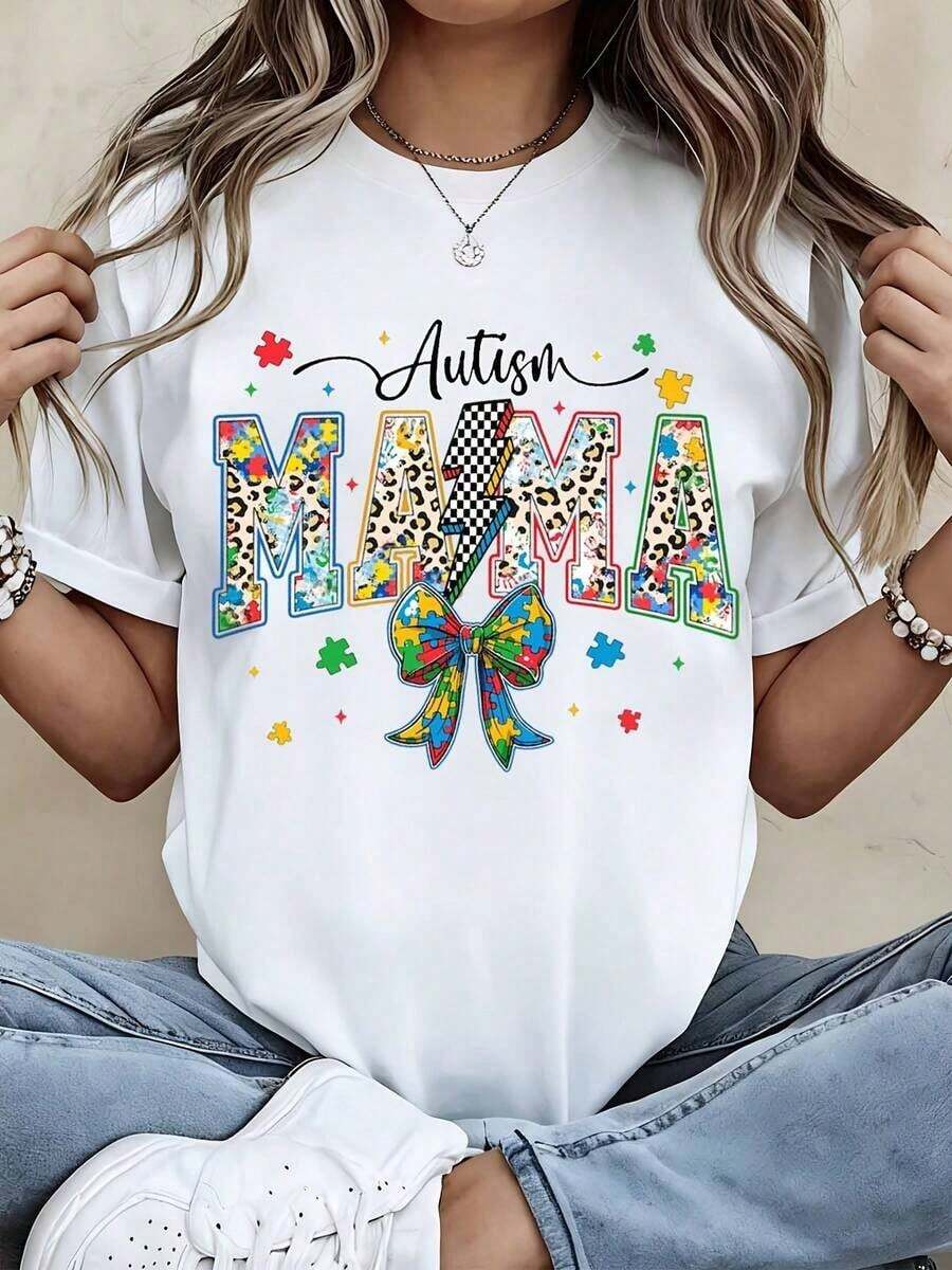 "Mama" T-Shirt With Colorful Puzzle Piece Design And Leopard Print For Awareness And Maternity Events. - White - View 1