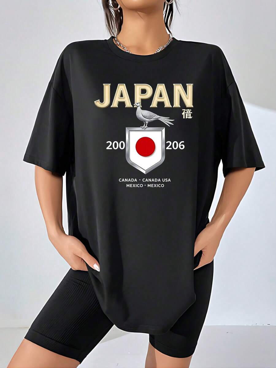 Símbolo inspirador con ave plateada sobre escudo que porta el sol rojo de Japón evocando paz y unión entre culturas y países como Canadá Estados Unidos y México camiseta de mujer 100% algodón cómoda y moderna ideal para uso diario - Negro - Ver 1