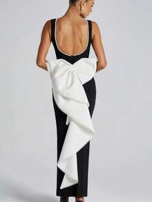 Vestido largo sin mangas de color negro y blanco con estilo de dama, nuevo modelo de primavera y verano 2026, estilo chica atrevida con espalda descubierta y lazo de perlas. - Negro - Ver 5