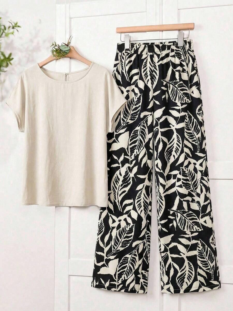 Conjunto de 2 piezas para mujer con blusa de unicolor de cuello redondo y manga corta, y pantalones anchos con estampado de flores para el verano - Multicolor - Ver 1