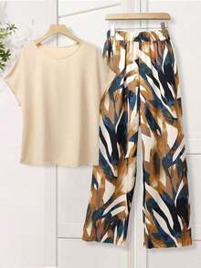 Conjunto de 2 piezas para mujer con blusa de unicolor de cuello redondo y manga corta, y pantalones anchos con estampado de flores para el verano - Amarillo - Ver 1