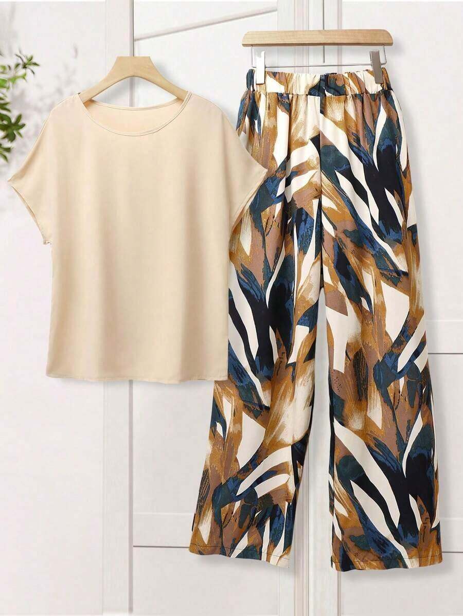 Conjunto de 2 piezas para mujer con blusa de unicolor de cuello redondo y manga corta, y pantalones anchos con estampado de flores para el verano - Amarillo - Ver 1