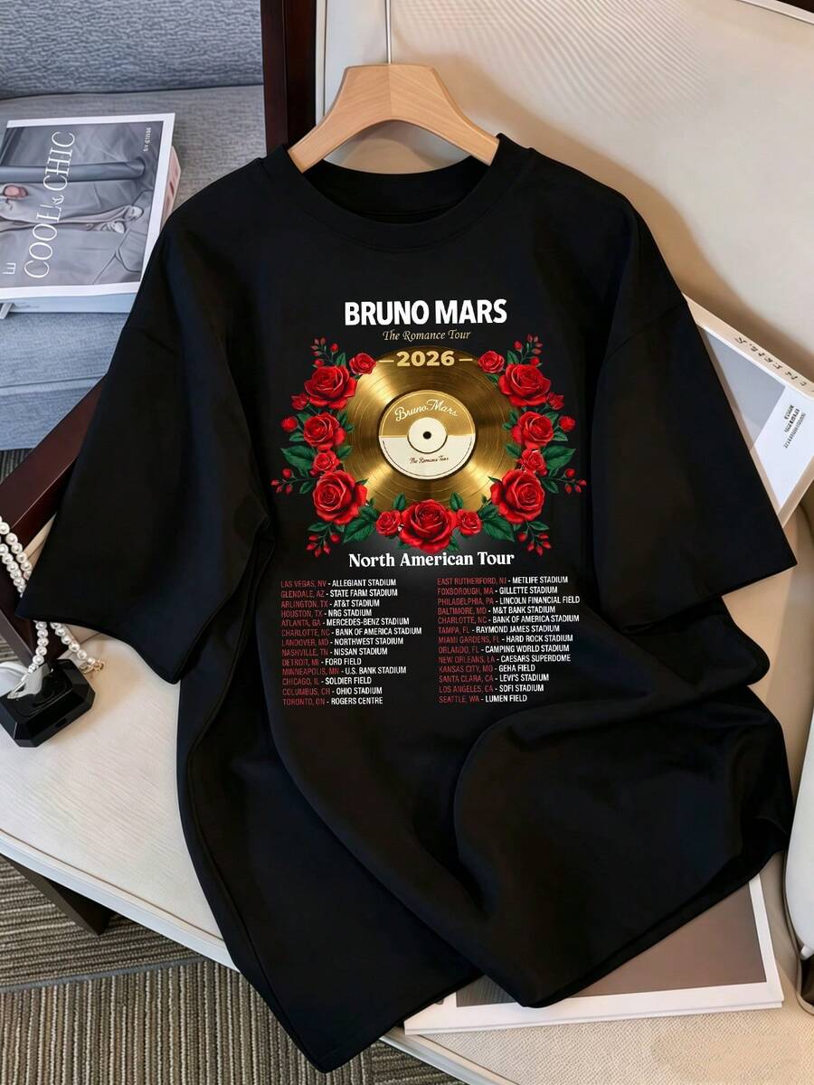 Bruno Marss T-Shirt 2026, The Romance Tour Graphic T-Shirt In Gold Vinyl, Pop Singer Tour Oversized T-Shirt, Black Cotton Casual Top, Retro Bootleg Style K-Pop Idol Oversized T-Shirt, Vintage Graphic Print T-Shirt, Short Sleeve Casual Top, K-Pop Fan Merchandise, Black Streetwear T-Shirt For Fans, Vintage K-Pop Star Graphic T-Shirt, Short Sleeve Oversized T-Shirt With Retro Lightning Bolt Letter Print, Black Casual Crew Neck Top, Streetwear Style Idol Fan Gift, Comfortable Loose Fit Cotton Blend T-Shirt For Women And Men. - Black - View 1