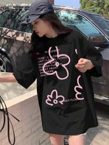 Camiseta de mujer de verano con ajuste holgado, cuello redondo y hombros caídos con estampado floral y de eslogan, "FLOWER SWEET HEART AND MORE" Blusas lindas y holgadas, Camisetas gráficas para Pascua - Negro - Ver 6