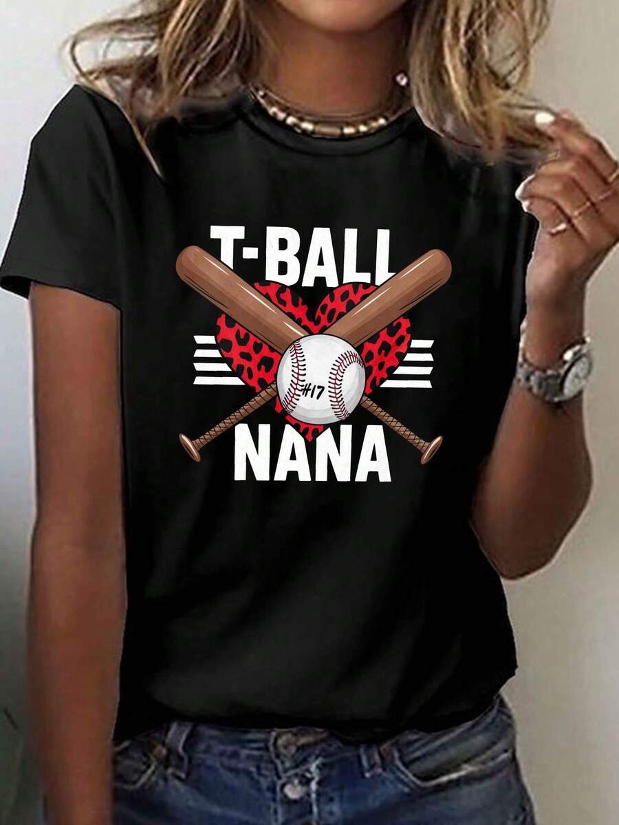 Camiseta clásica de manga corta y cuello redondo para mujer, con estampado de béisbol en forma de corazón y "T-Ball Nana", perfecta para primavera y verano. Éxito de . - Negro - Ver 1