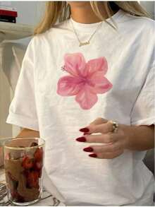 Plus size sommartoppar - Rosa t-shirt med hibiskusblommönster för dam | Vit t-shirt med livfullt blommönster | Sommarmode | Mjuk och bekväm | Lämplig för fritidsaktiviteter | Eleganta accessoarer, kombinera med ett fint namnhalsband och en bomulls-t-shirt. - Vitt - Visa 7