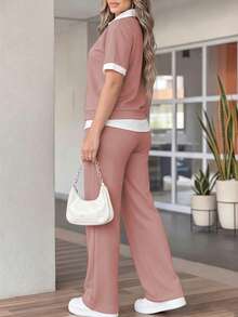 Bộ 2 món áo polo tay ngắn cổ bẻ và quần ống rộng cạp chun dành cho nữ, thích hợp cho mùa xuân/hè. Áo polo phối màu tương phản với quần ống rộng, phù hợp cho các hoạt động thể thao ngoài trời, tập thể dục, đi làm và thời trang đường phố. - Hồng - Xem 5