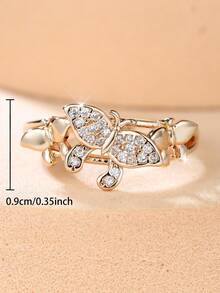 1 eleganter und exquisiter Damenring mit kubischen Zirkoniasteinen in Schmetterlings-Design - perfekt als einzigartiges Schmuckstück oder Modeaccessoire für Frauen, oder als Geburtstagsgeschenk oder Alltagsaccessoire für sie - Goldgelb - Übersicht 2