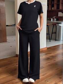 Ladies Two Piece Set Camiseta Manga Corta + Wide Leg Pants - Negro - Ver 2
