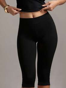 XLLAIS Pantalones deportivos casuales elásticos negros de mujer con dobladillo dividido, de largo capri, para verano - Negro - Ver 7