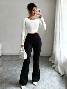 Calça legging de ioga de cintura alta, justa, cor sólida, pernas largas, minimalista, com controle abdominal, modelagem flare, calça esportiva casual e elástica com cós e etiqueta com logo, levanta o bumbum e afina a cintura. - Preto - Ver 5