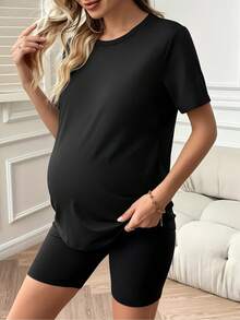 Suave [Ropa de Maternidad] Dos ranas están leyendo un libro en un tronco de árbol; hoy es un gran día para leer los interesantes libros de Rana y Sapo. Camiseta estampada, top casual de manga corta y cuello redondo, adecuada para verano y primavera, ropa de mujer, blusas elegantes para damas. - Negro - Ver 2