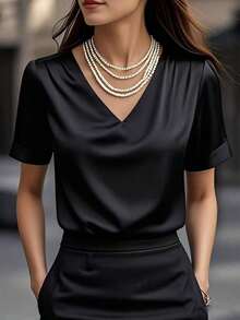 1 pieza Blusa de mujer de unicolor de satén con cuello en V y manga corta, elegante y de moda para uso diario, oficina, hogar, citas, primavera/verano, color negro casual - Negro - Ver 1