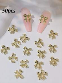50 chiếc phụ kiện trang trí móng tay hình nơ vàng bạc sang trọng, nơ đính đá 3D bằng hợp kim, phụ kiện ruy băng kim loại cho nữ tự làm móng. - Nhiều màu - Xem 8