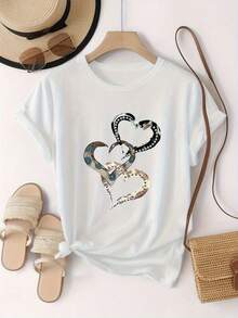 El epítome de "emoción y amor", esta camiseta de manga corta para mujer presenta un estampado de corazón metálico, moderno y a la moda, con un cuello redondo sencillo y un diseño casual versátil, adecuada para el ocio, viajes, vacaciones y otras actividades. - Blanco - Ver 5