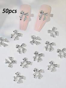 50 chiếc phụ kiện trang trí móng tay hình nơ vàng bạc sang trọng, nơ đính đá 3D bằng hợp kim, phụ kiện ruy băng kim loại cho nữ tự làm móng. - Nhiều màu - Xem 7
