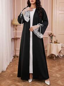 Áo Abaya dài thanh lịch dành cho nữ với tay áo loe ren tương phản, chất liệu vải dệt. - màu đen - Xem 1