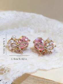 1 Đôi bông tai hình trái tim nhỏ nhắn, xinh xắn, đa năng và thanh lịch, phù hợp cho phụ nữ đeo hàng ngày, dự lễ hội và tiệc tùng. - Yêu - Xem 5