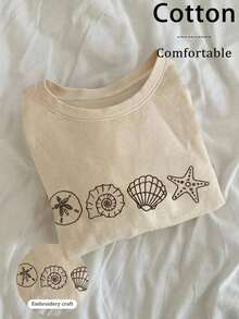 Camiseta con bordado de conchas y estrella de mar, estilo costero y minimalista, ideal para looks frescos y con aire veraniego. - Blanco - Ver 4