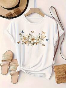 Diseño Simple y Versátil: Patrón de mariposas y peonías blancas, camiseta de manga corta con cuello redondo, corte ligeramente holgado, esencial para vacaciones informales, lavable a máquina, no apta para limpieza en seco, tejido de punto, adecuada para todas las estaciones, camiseta de algodón. - Blanco - Ver 1