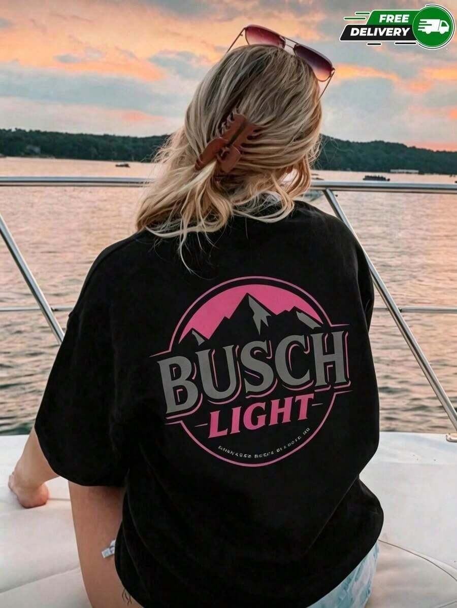 PremiumCamiseta para mujer de poliéster en color negro con estampado de Busch Light rosa en la espalda – casual y transpirable, envío nacional en México Eco-Friendly - Negro - Ver 1