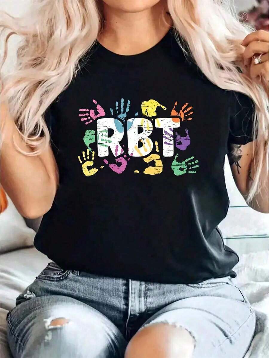 Camia para Mujeres Concientizadas sobre Enfermedades Mentales, Técnica de Comportamiento Registrada (RBT) - Diseño con Estampado de Manos Coloridas y Letras, Cuello Redondo Casual y Suave, Manga Corta, Elasticidad Media, Lavable a Máquina, Apta para Todas las Temporadas, Ideal para ABA, Terapeutas y Apoyadores - Transpirable y cómoda. - Negro - Ver 1