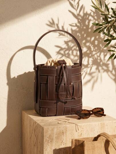 Woven Bucket Shoulder Bag, Minimalist Faux Leather Handbag, Suitable For Daily Wear, Features Faux Leather Woven Texture And Bucket Shape, Adjustable Shoulder Strap For Shoulder Or Crossbody Carry, Interior Drawstring Pouch For Organized Storage, Contrasting Stitching Details Add Sophistication, Great For Work, Shopping And Everyday Outfits.