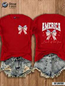 [Entrega Local] Playera para Mujer - Camiseta con estampado de lazo y bandera de "Tierra de los Libres" de Women's America - Atuendo para el 4 de julio, top casual de cuello redondo con diseño de mapa, adecuado para primavera y verano, regalo (Envío local) - Rojo - Ver 1