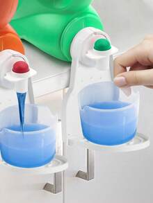 Giá đỡ cốc đựng bột giặt, vòi phun được nâng cấp với công tắc dễ nhấn giúp ngăn ngừa tràn và vương vãi, bao gồm giá đỡ cốc đựng bột giặt và khay hứng nước giúp sắp xếp và tiết kiệm không gian. - Nhiều màu - Xem 11