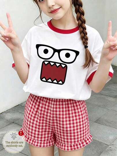 This 2 Pieces Set Designed For Girls Includes A Short Sleeve Top And A Red Plaid Shorts. The Highlight Is The Eye-Catching Red And White Contrast Collar Design, Decorated With A Fashionable And Playful "Glasses And Teeth" Star Pattern.