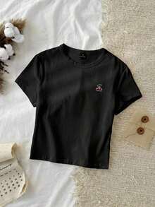 woman Todo tipo de impresiones, chaqueta, camiseta de cuello redondo, casual, para oficina, para viajar, muy popular, viento deportivo, estampado/patrón, camiseta de algodón 100%, camiseta casual, cómoda, suave, transpirable The latest popular bestsellerCamiseta corta de manga corta, cuello redondo, ajustada y recortada de unicolor minimalista casual para mujer, vintage, softgirl, elegante. Se puede usar en todas las estaciones, old money, salidas de verano, en casa, vuelta al cole, otoño. - Negro - Ver 4