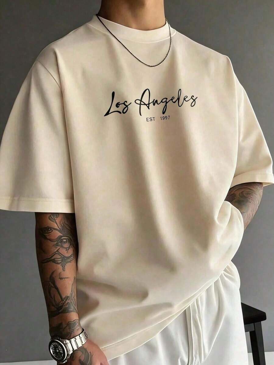 This Modern Men's Unisex Short-Sleeved T-Shirt Features A Crew Neck And A Casual Yet Stylish Design, Perfect For Everyday Wear And School. Made From Comfortable Fabric, It's A Summer Essential. One-Piece Construction, Machine Washable. - Summer Wear Breathable - 杏 - 查看 1