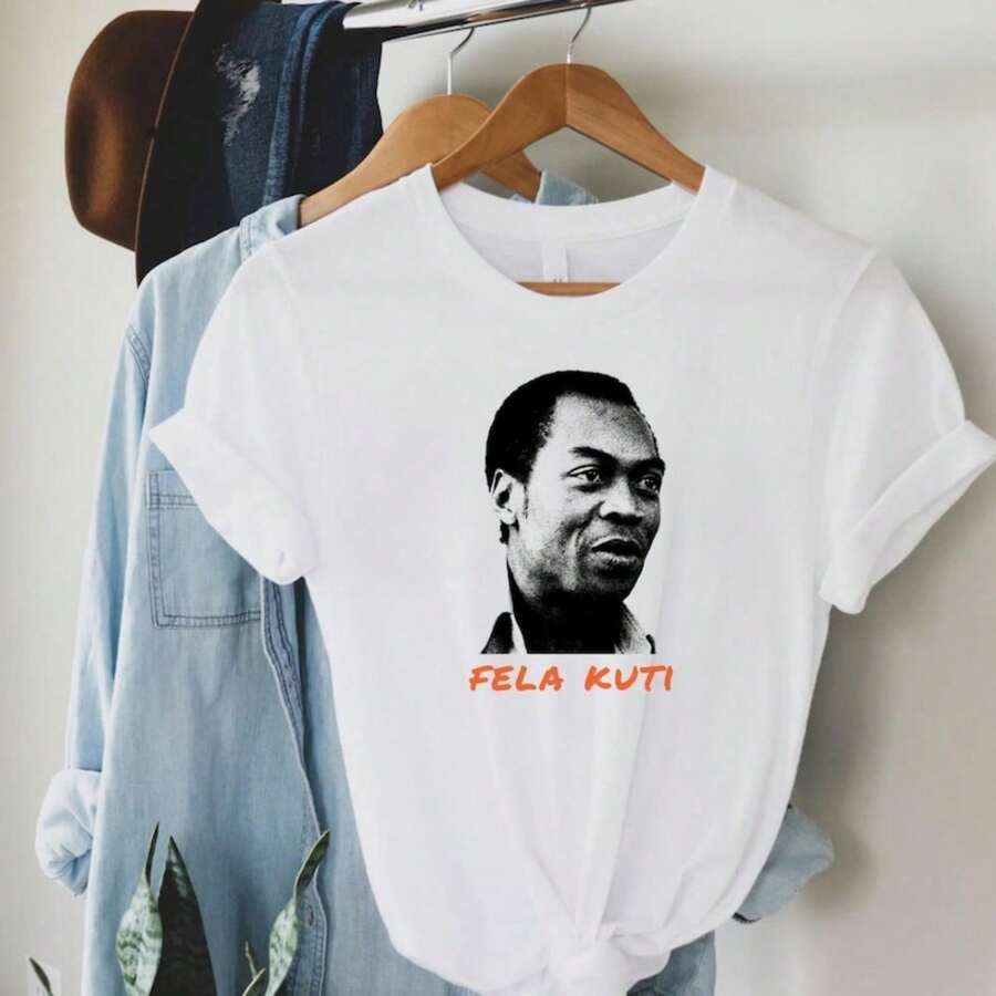 Fela Kuti T-Shirt – Afrobeat Pioneer Graphic T1EE.JPG 100% Cotton Unisex T-Shirt - Premium Casual Comfortable Fit - trắng - Xem 1