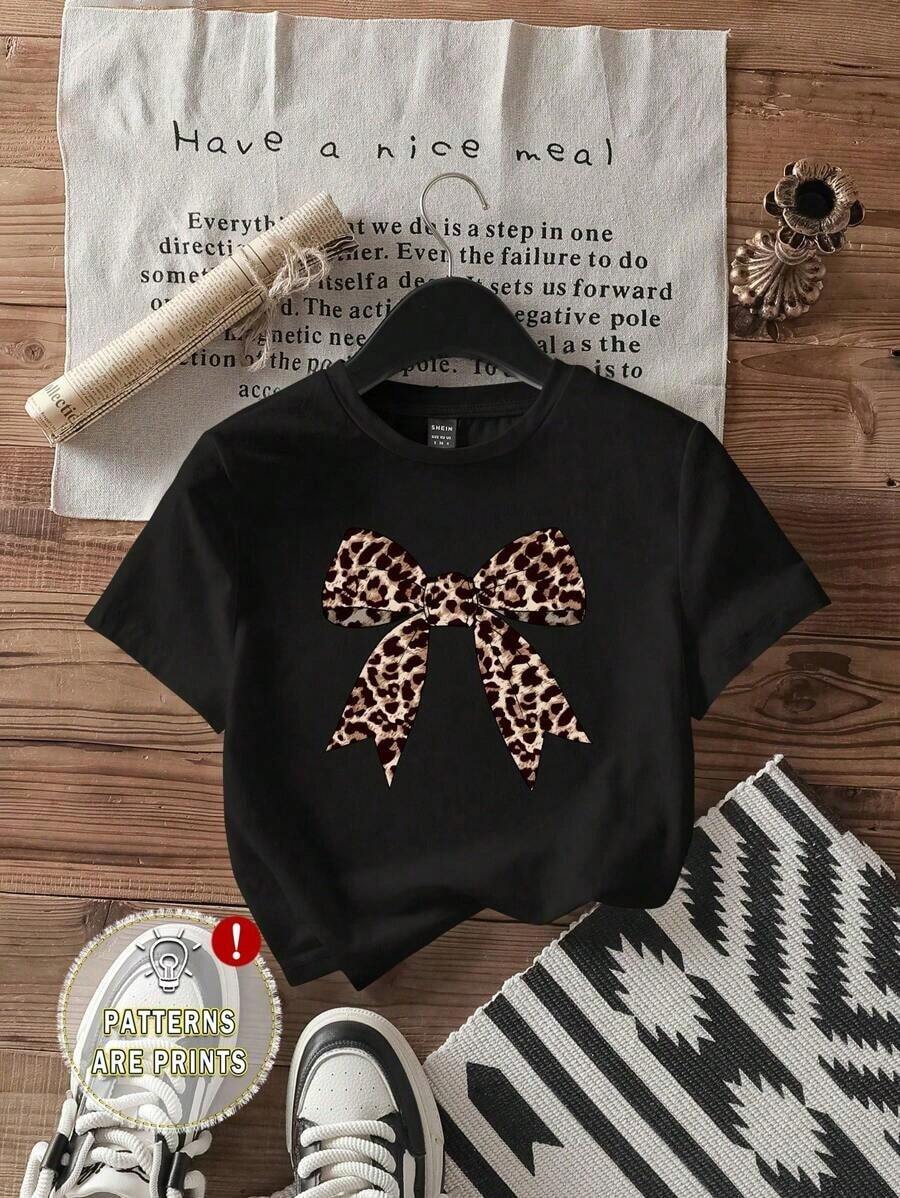 Envío gratis, entrega local enéxico, entrega en 4 días. Camiseta de manga corta con cuello redondo y estampado de leopardo minimalista para mujer, con lazo, para verano. - Negro - Ver 1