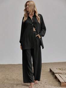 Conjunto camisa larga bajo con abertura con pantalones de pierna ancha - Negro - Ver 4