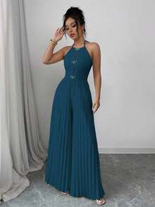 Elegante mono de mujer con cuello de halter, lazo delantero con piedras de cristal, plisado y piernas anchas en color albaricoque - Azul - Ver 5