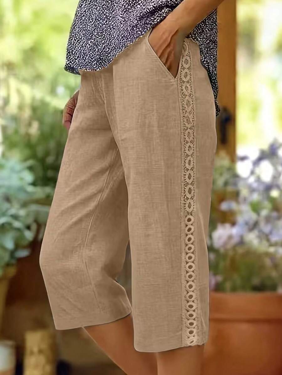 2026 Nuevos Pantalones Capri casuales de primavera/verano para mujer con bolsillos en diagonal y adorno floral lateral - Caqui - Ver 1